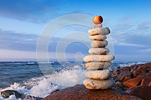 Concept of balance and harmony. Rock Zen at sunset.