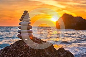 Concept of balance and harmony - stone stack on the beach
