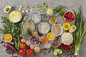 Concept balanced diet of fruits, vegetables, seeds, legumes, grains, cereals, herbs and spices. Products containing vitamins,