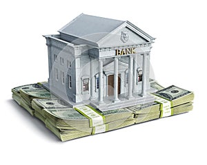 Concept of bank building based on wads of money photo