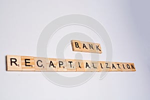 Concept of bank recapitalization on isolated background photo