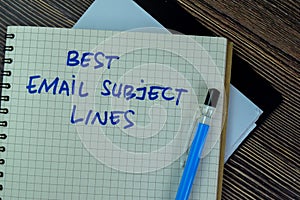 Concept of Best Email Subject Lines write on a book isolated on Wooden Table