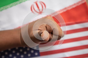 Concept of bilateral relations of US and Iran deal showing with flag and hands showing of deal gesture