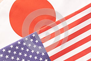 Concept of Bilateral relationship between two countries showing with two flags: The United States of America and Japan