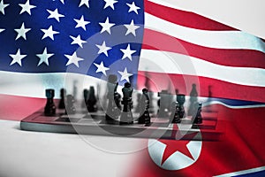 Concept of Bilateral relationship between two countries showing with two flags: United States of America and North Korea