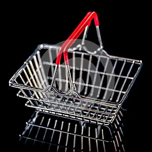 Concept of black friday advert sale empty metal shopping basket