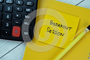 Concept of Breakout Session write on sticky notes isolated on Wooden Table