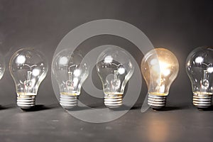 Concept of bright idea with series of light bulbs