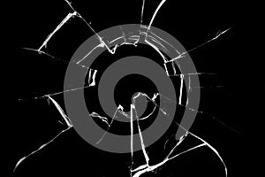 Concept of broken glass with hole for design on black background.