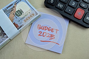 Concept of Budget 2025 write on sticky notes isolated on Wooden Table