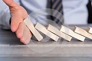 Concept of business control by stopping domino effect