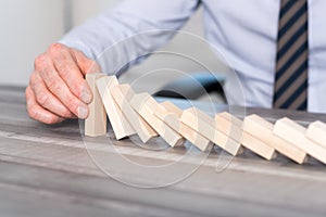 Concept of business control by stopping domino effect