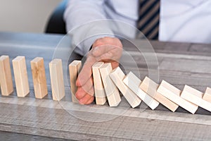 Concept of business control by stopping domino effect