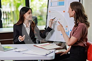 Concept of business office woman working,Businesswoman smile while working about her invesment plan with analyzing document and