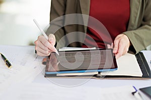 Concept of business office woman working,Closeup businesswoman checking her invesment plan with analyzing document and business