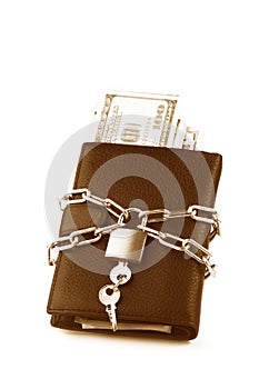 Concept of business safety or financial protection or restriction access. Wallet in chain with padlock isolated on white