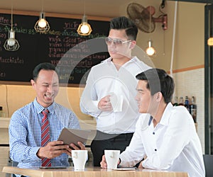 Concept Business talk Meeting Relex in coffee shop,table tablet