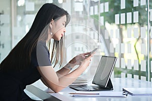 Concept business woman working and people happy businesswoman or creative female office worker with computers writing to notebook