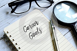 Concept of career goals written on a notebook