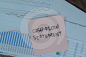 Concept of Cash-Flow Statement write on sticky notes isolated on Wooden Table