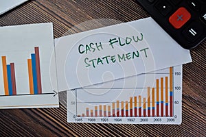 Concept of Cash Flow Statement write on sticky notes isolated on Wooden Table