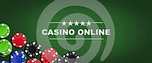 Concept, Casino Online. Poker chips on a green poker background. Vignette. Gamble banner. Playing cards