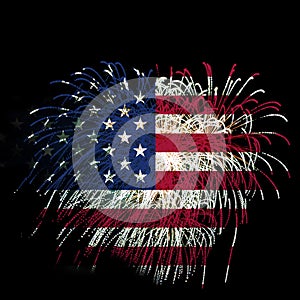 Concept of celebrating Independence Day in United States of America. USA national flag with fireworks backdrop for 4th of July