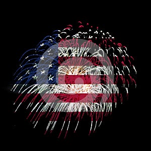 Concept of celebrating Independence Day in United States of America. USA national flag with fireworks backdrop for 4th of July