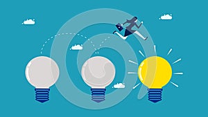 Concept change. Business readjustment. A businessman jumps to a new light bulb