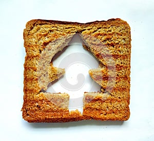 Concept of Christmas morning breakfast meal. Funny christmas tree toasted brown bread for kids.