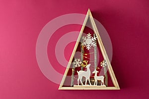 Concept - Christmas wood background with lights and tree with copy space