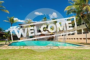 Concept city welcome after quarantine, COVID-19. Swimming pool on site surrounded by palm trees