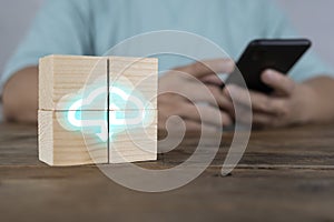 Concept of cloud computing. Stack of wooden block cube with computing icon online connection database digital
