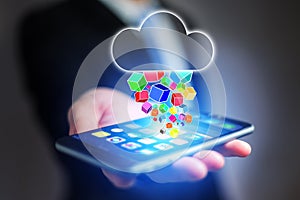 Concept of cloud storage icon flying out a smartphone - technology concept