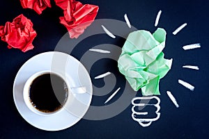 Concept coffee awakens brain on dark background top view