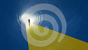 Concept or conceptual blue and yellow tunnel, the Ukrainian flag colors, with a bright light at the end as metaphor to hope and