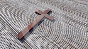Rusted metal cross on a natural wood or wooden logg background. 3d illustration metaphor for God, Christ photo