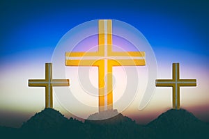 Concept conceptual yellow cross religion symbol silhouette in nature