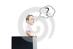 Concept for confusion, inspiration and solution. little boy looks out of the box, looking for the answer, the question mark, the