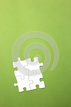 Concept of connection in a group. working relationship or friendship, union . white on green background. copy space