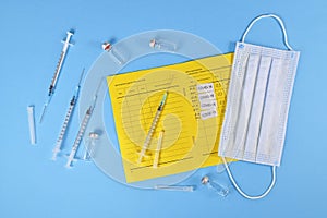 Concept for Corona virus booster vaccination showing vaccine passport with 4 entries