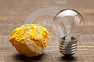 Concept creative idea. concept of creative idea. Bulbs of crumpled paper and light bulb. metaphor, inspiration