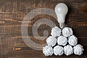 Concept creative idea. concept of creative idea. Bulbs of crumpled paper and light bulb. metaphor, inspiration