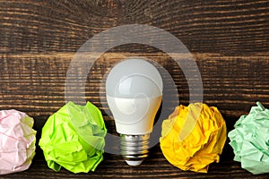 Concept creative idea. concept of creative idea. Bulbs of crumpled paper and light bulb. metaphor, inspiration