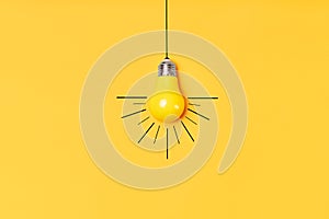 Concept creative idea with lightbulb on yellow background