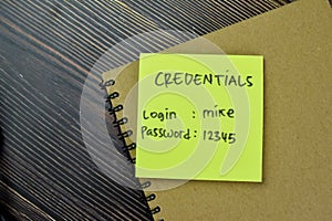 Concept of Credentials, Login and Password write on sticky notes isolated on Wooden Table