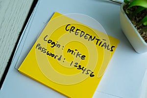 Concept of Credentials, Login and Password write on sticky notes isolated on Wooden Table