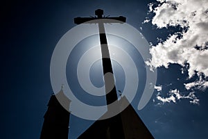 Concept cross religion symbol silhouette over sky. Christian religion background concept. The cross symbol for Jesus Christ.