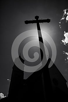 Concept cross religion symbol silhouette over sky. Christian religion background concept. The cross symbol for Jesus Christ.