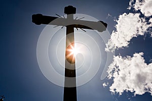 Concept cross religion symbol silhouette over sky. Christian religion background concept. The cross symbol for Jesus Christ.